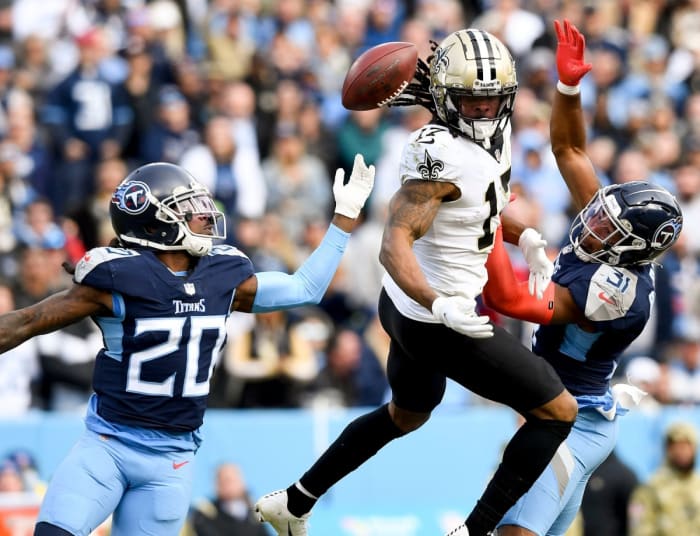 Titans cornerback Janoris Jenkins (20) and safety Kevin Byard (31) break up a pass intended for Saints receiver Kevin White (17). George Walker IV / Tennessean.com / USA TODAY NETWORK
